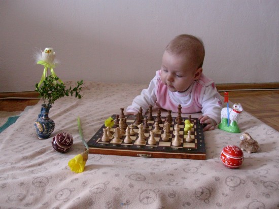 Teresa plays chess on Easter Sunday morning